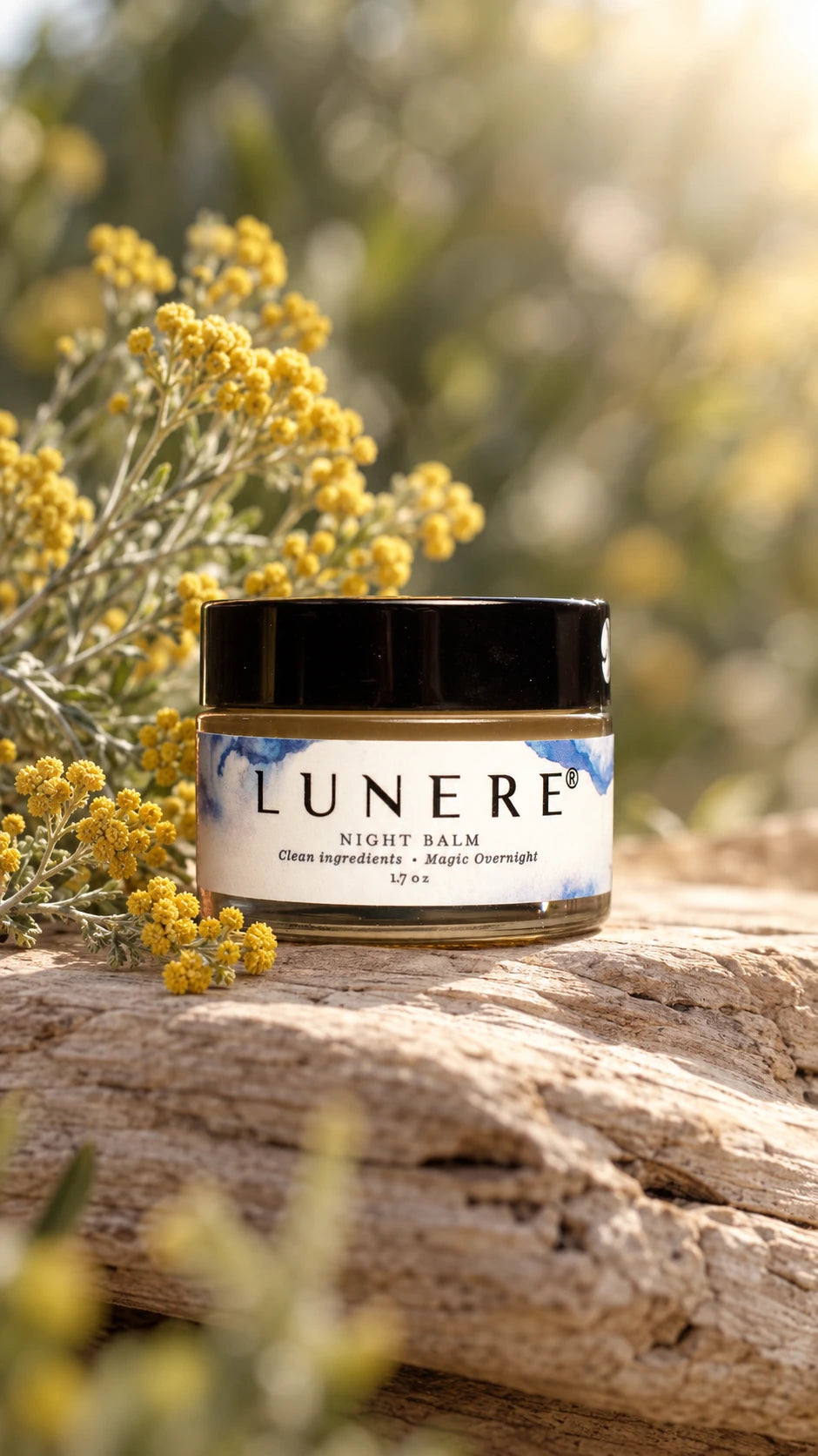 Lunere Night Balm with helichrysum flowers in warm botanical light